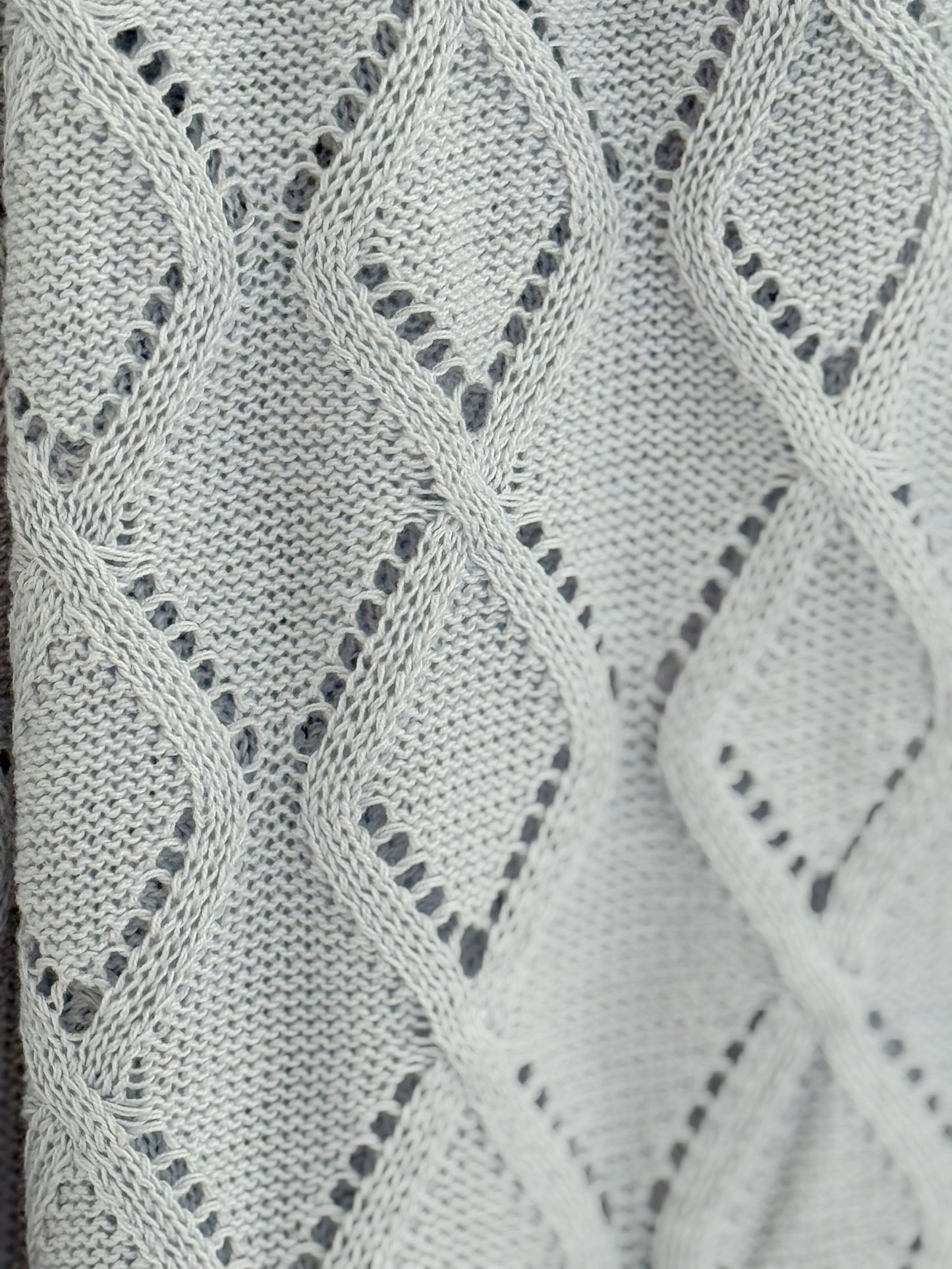 Manta Ochos Gris Perla